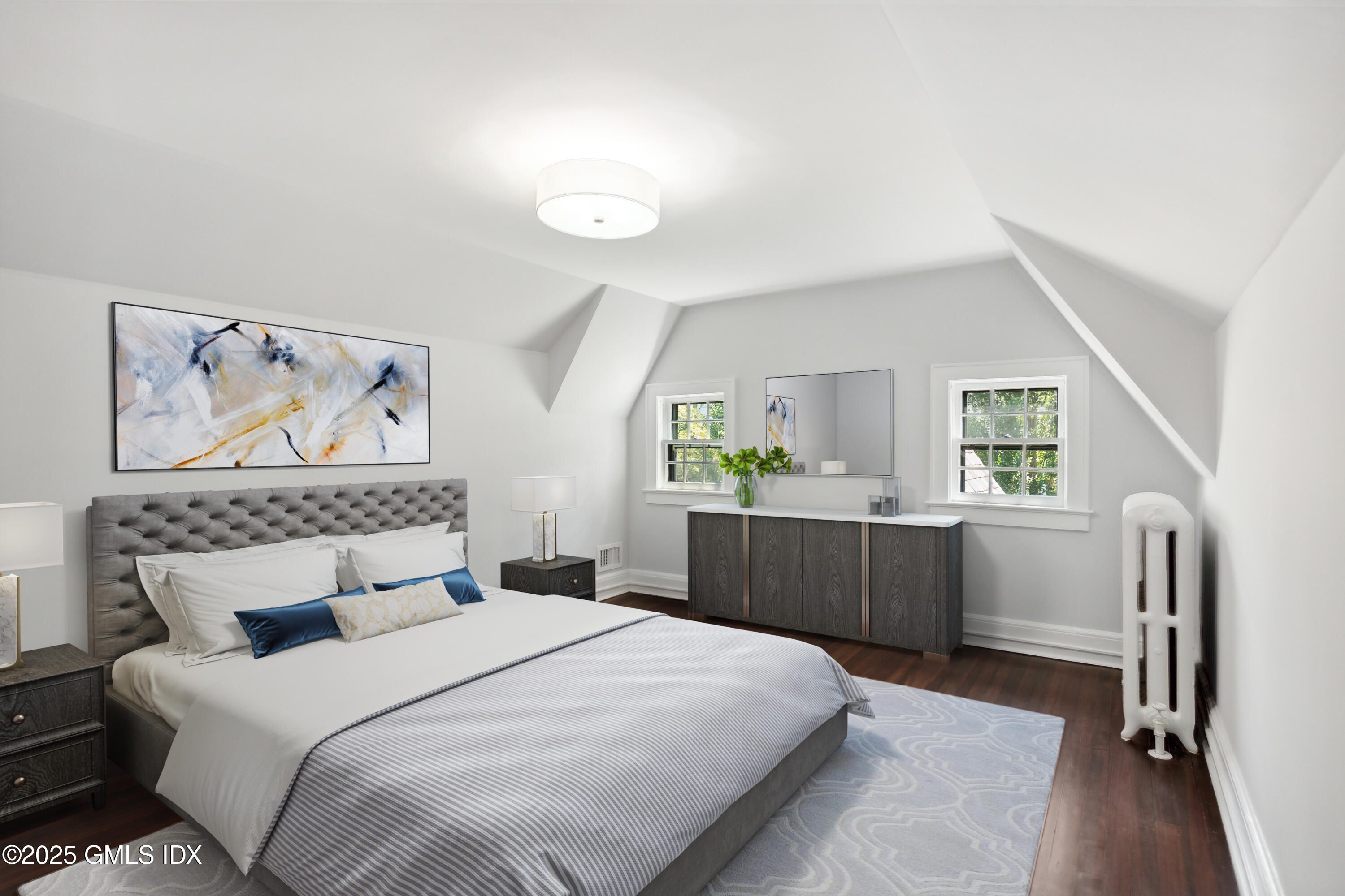 106 Patterson Avenue Greenwich, CT 06830 - Photo 16 of 25 a bedroom with a bed and a window