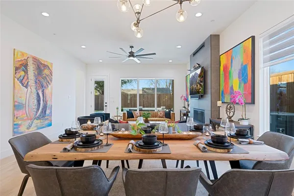 a view of a dining room with furniture window and outside view