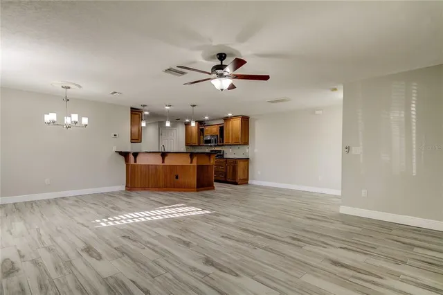 a view of a kitchen with a sink and cabinet area