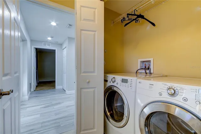a view of livingroom with washer and dryer