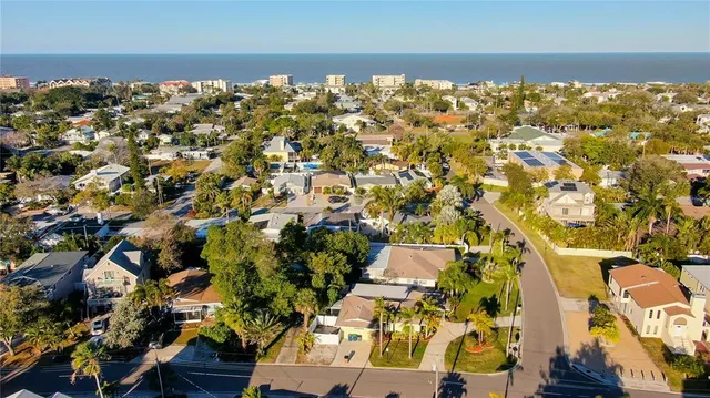 an aerial view of residential building with parking space