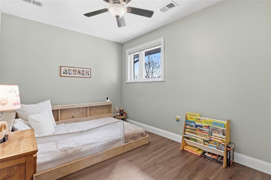 161 Harmony Road Wexford, PA 15090 - Photo 20 of 34 a bedroom with furniture and wooden floor