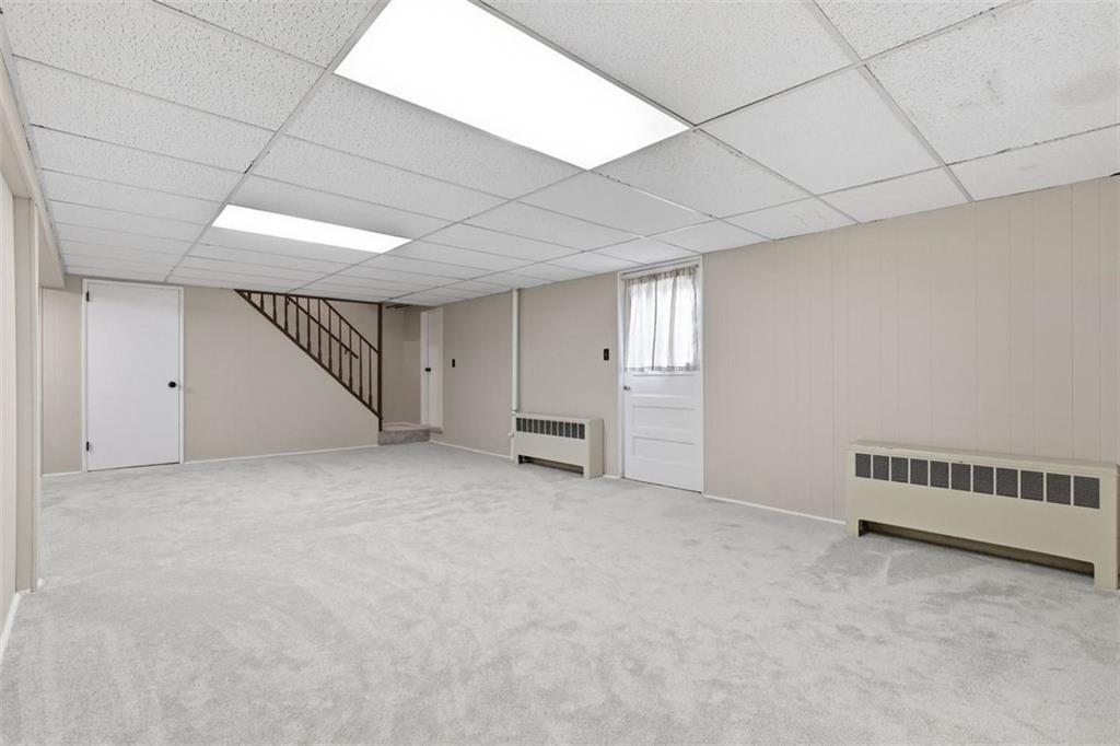 161 Harmony Road Wexford, PA 15090 - Photo 24 of 34 a view of an empty room with a ceiling fan