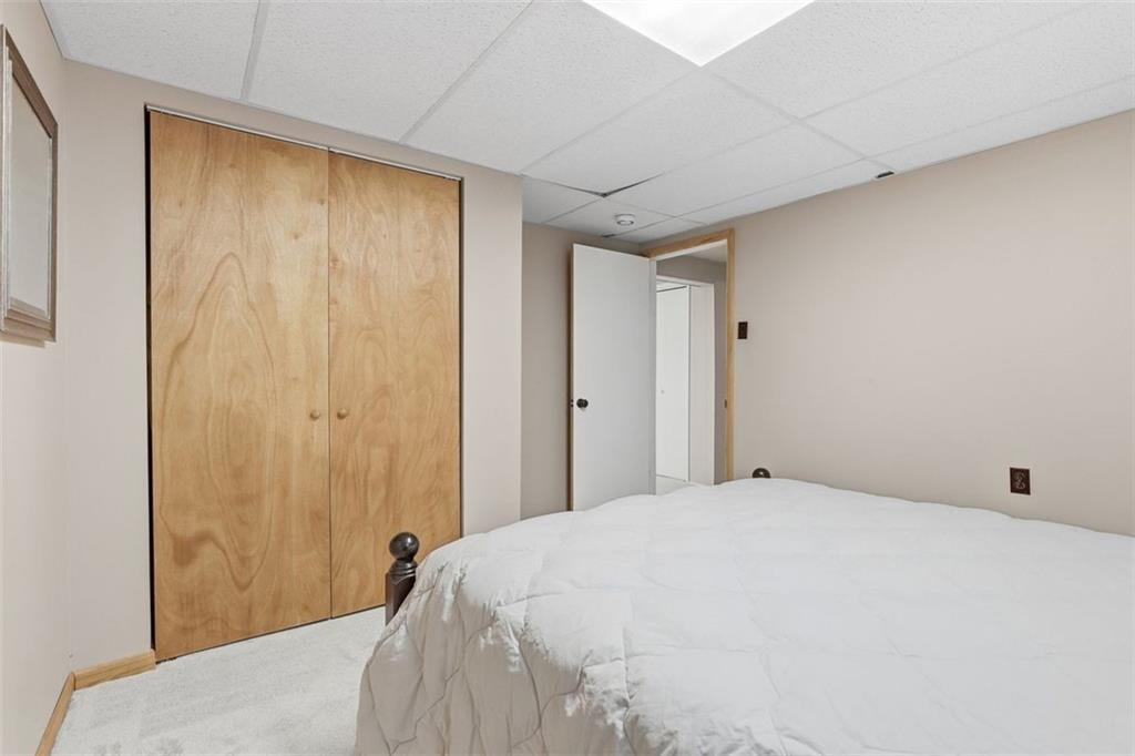 161 Harmony Road Wexford, PA 15090 - Photo 31 of 34 a bedroom with a bed and a shower