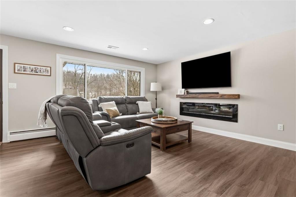 161 Harmony Road Wexford, PA 15090 - Photo 4 of 34 a living room with furniture and a flat screen tv
