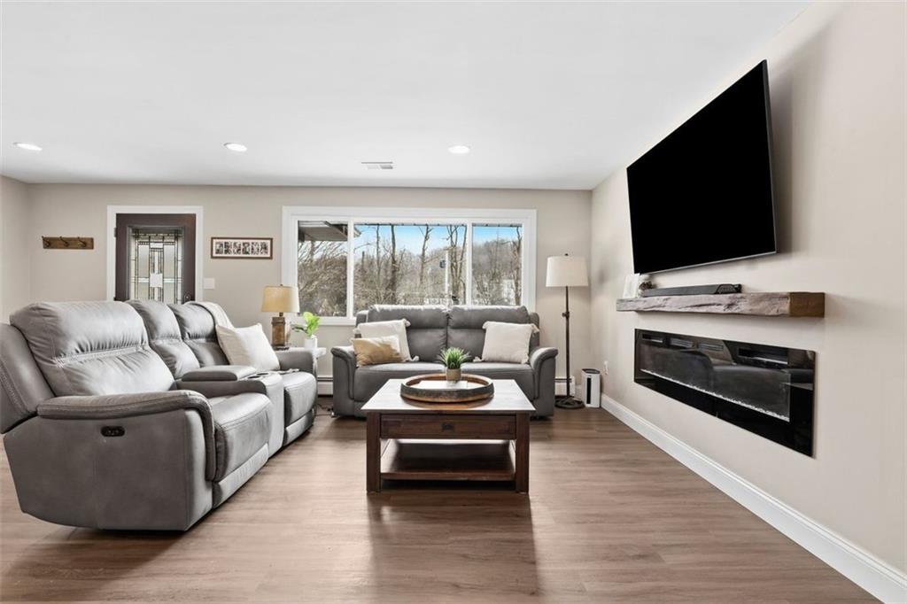 161 Harmony Road Wexford, PA 15090 - Photo 5 of 34 a living room with furniture and a flat screen tv
