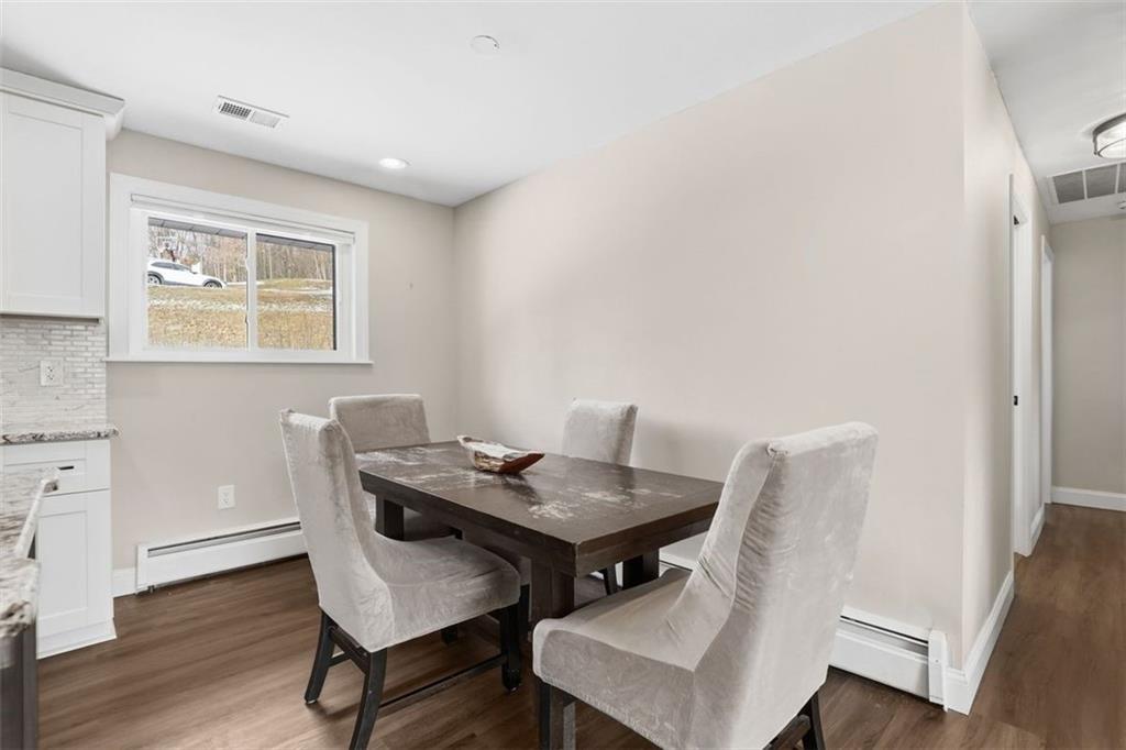 161 Harmony Road Wexford, PA 15090 - Photo 6 of 34 a view of a dining room with furniture and wooden floor
