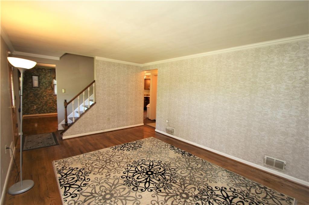 226 Waynesburg Road Washington, PA 15301 - Photo 11 of 24 Large Living Room w/ Original Hardwood Floors. Quality through-out this Brick House boasting Original Hardwood Floors, Plaster Walls & Marble Window Sills