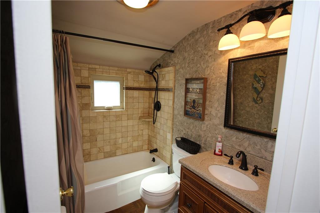 226 Waynesburg Road Washington, PA 15301 - Photo 16 of 24 Beautifully Updated 2nd Level Full Bathroom w/ Parquet Wood Floors & Ceramic Tile Tub Surround