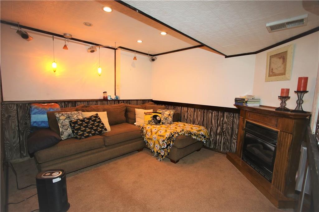 226 Waynesburg Road Washington, PA 15301 - Photo 18 of 24 Nice 10x9 Lower Level Game Room w/ Gas Fireplace & Recessed Lighting