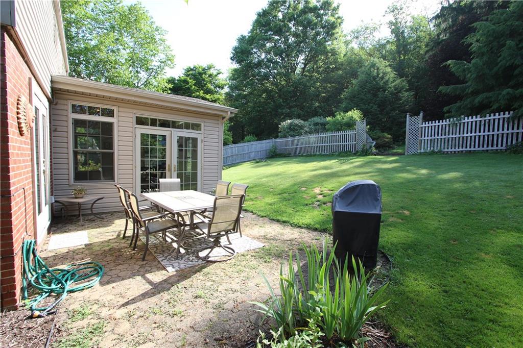 226 Waynesburg Road Washington, PA 15301 - Photo 7 of 24 View of Patio off Sun Room & 1st Floor Master Bedroom leading into Awesome, Mostly Private Fenced Back Yard w/ Shed & Firepit area in Upper area thru gate!