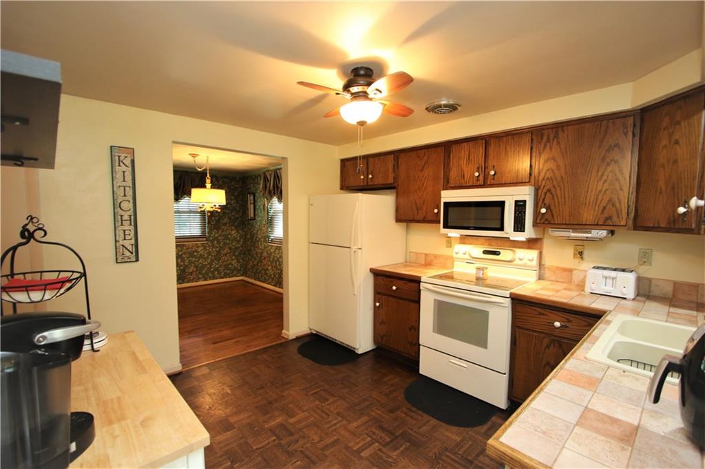 226 Waynesburg Road Washington, PA 15301 - Photo 10 of 24 Huge 11x11 Kitchen w/ Plenty of Room for all the Chefs. Attractive Ceramic Tiled Counter Tops
