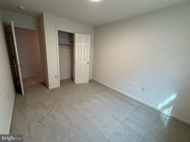 an empty room with closet