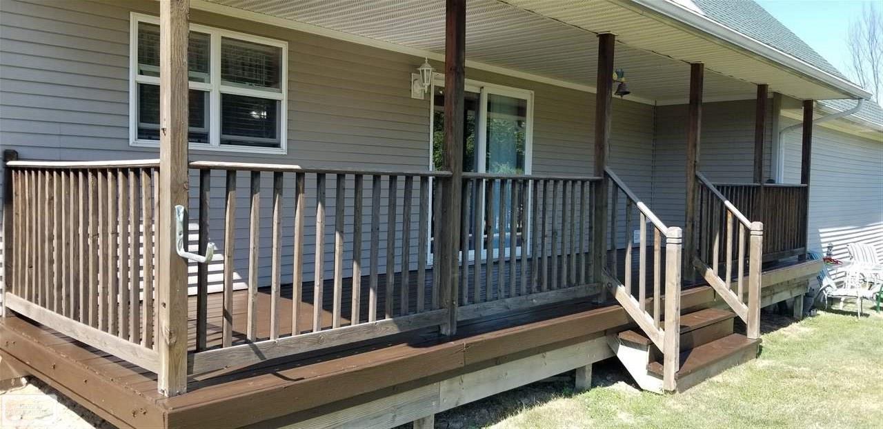 13847 Masters Road Allenton, MI 48002 - Photo 34 of 37 Covered Porch on the rear of the home.