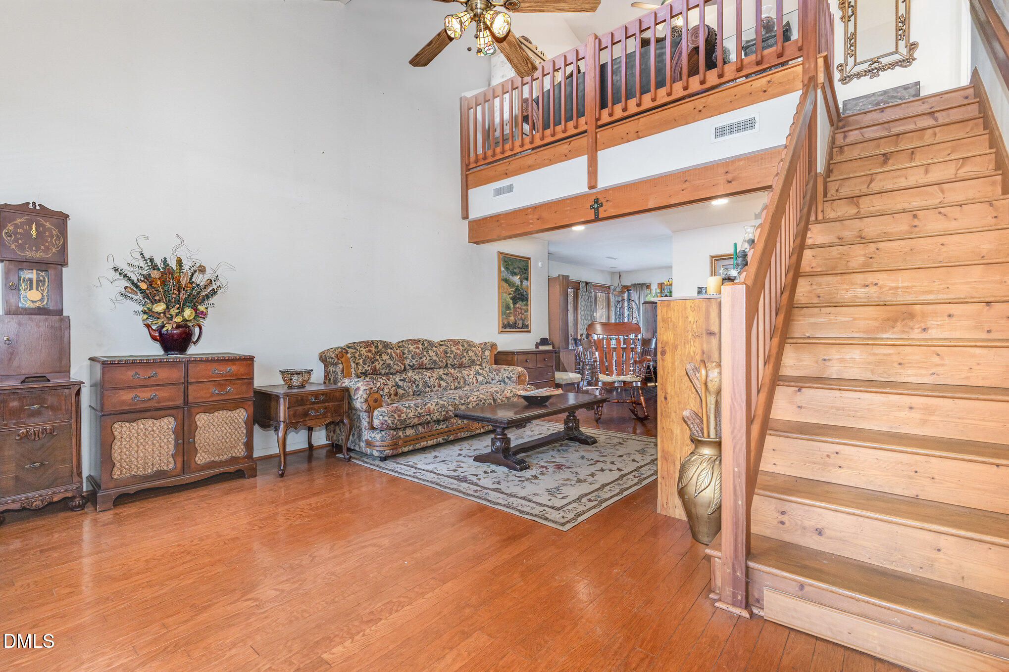 8516 Dunlee Falls Road Raleigh, NC 27613 - Photo 10 of 21 a living room with furniture and a table