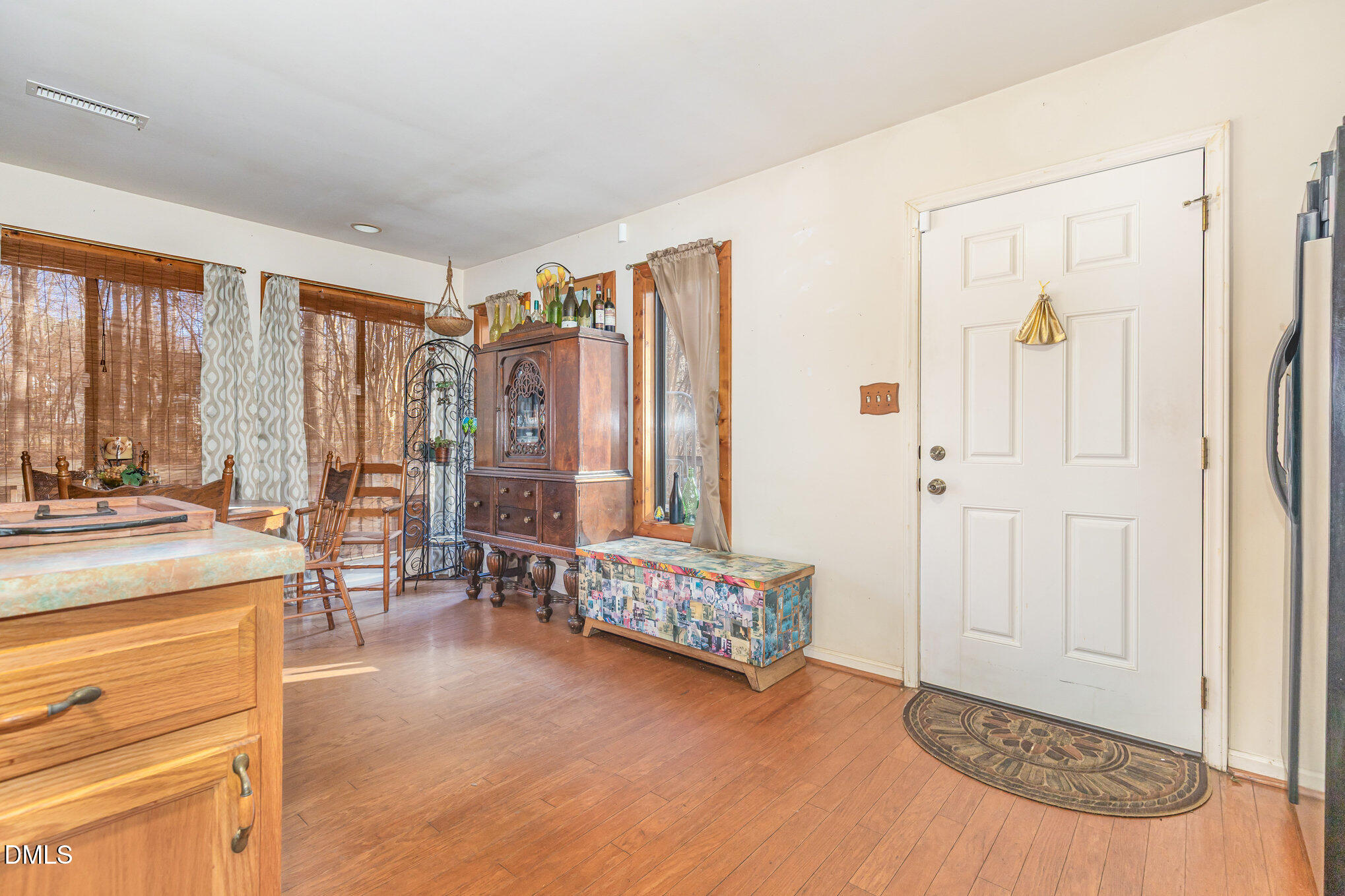 8516 Dunlee Falls Road Raleigh, NC 27613 - Photo 4 of 21 a view of a livingroom with furniture window and outside view
