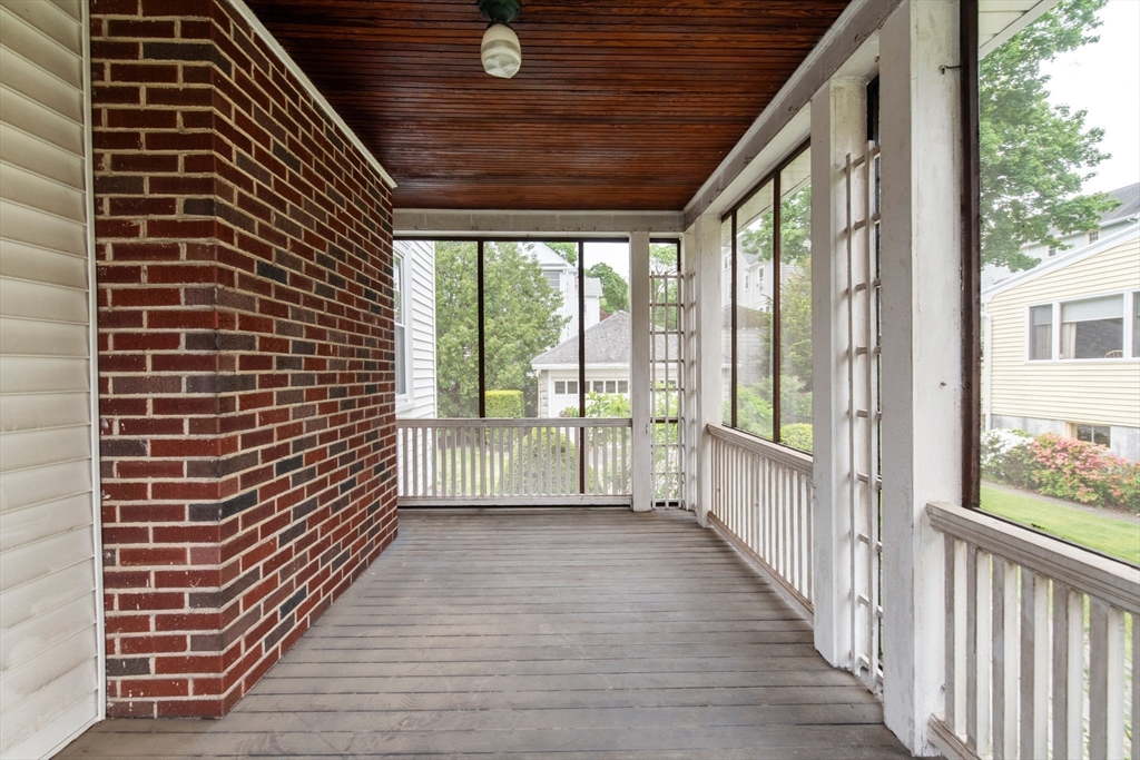 38 Bailey Road Arlington, MA 02476 - Photo 6 of 30 a view of a room with wooden floor and windows