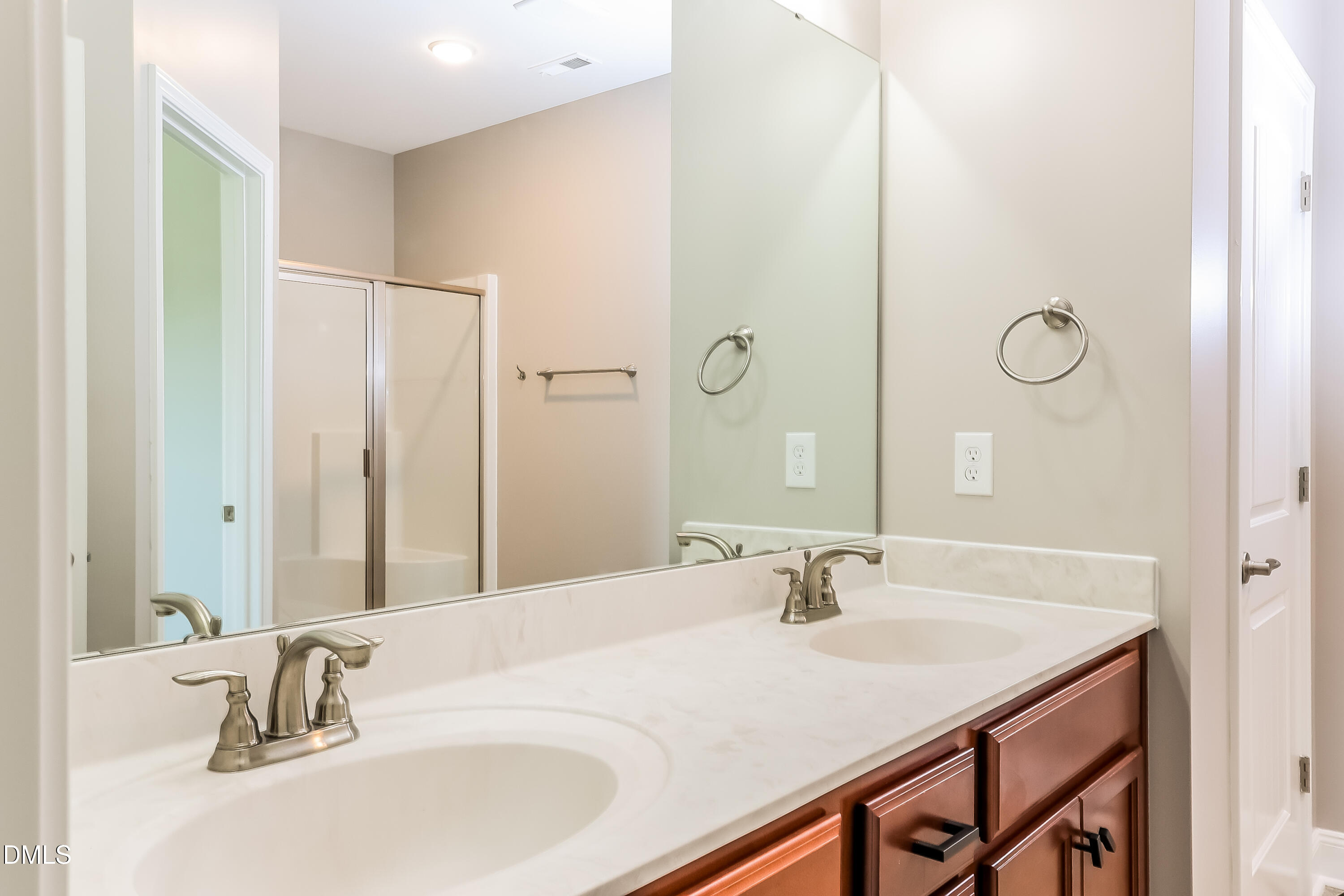 96 Longo Lane Benson, NC 27504 - Photo 9 of 16 a bathroom with a sink and a mirror