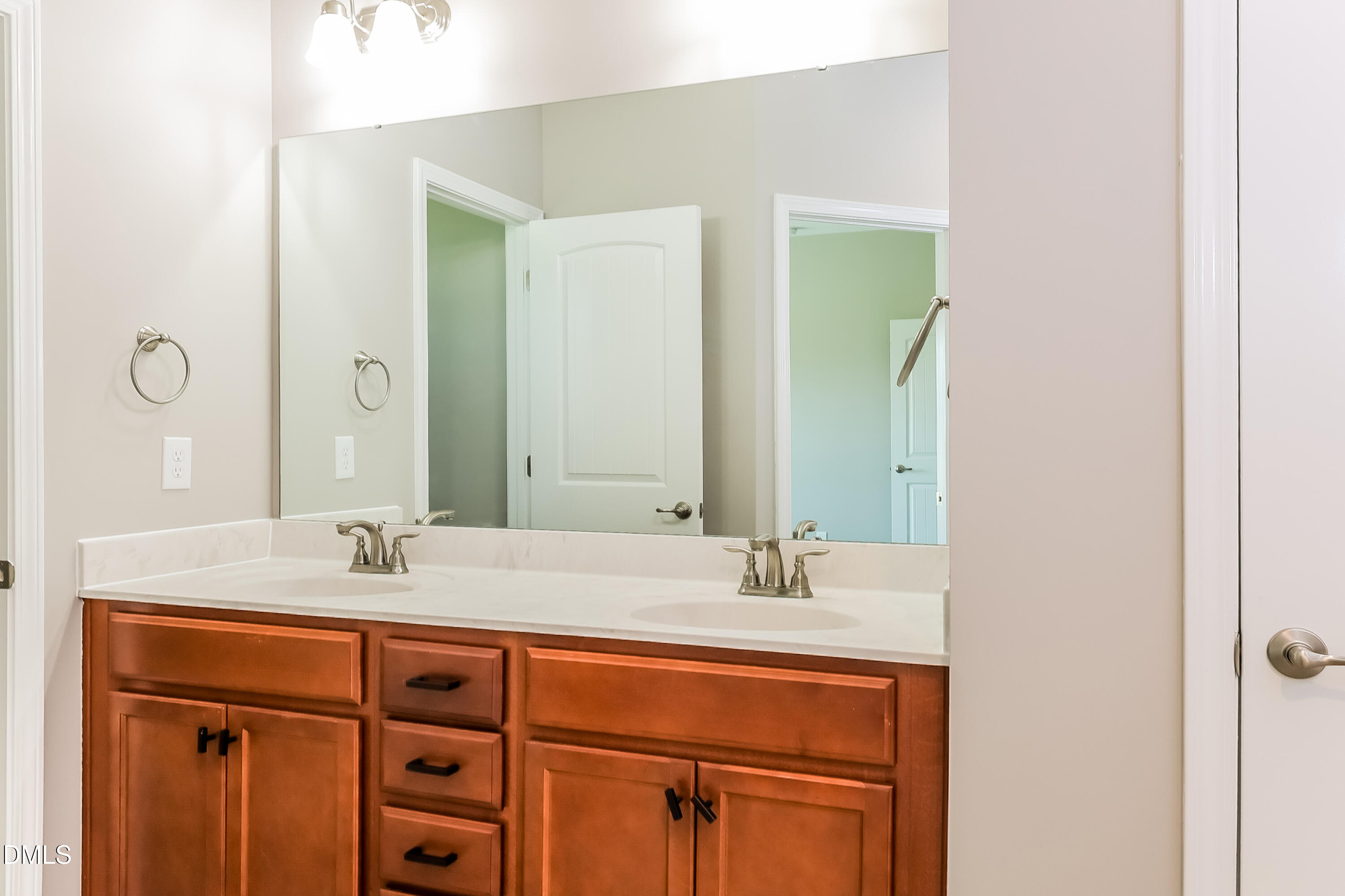 96 Longo Lane Benson, NC 27504 - Photo 10 of 16 a bathroom with a sink and a mirror