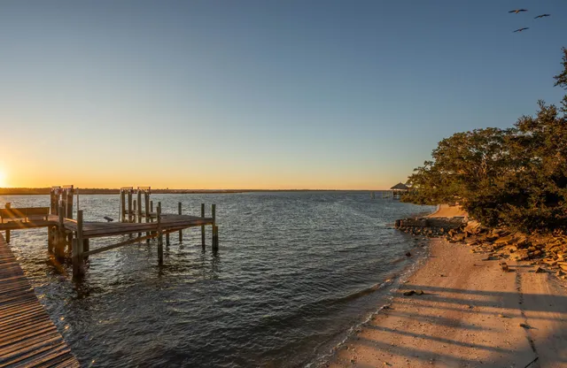 a view of a terrace with a lake view