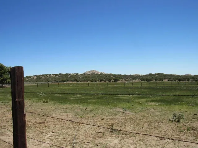 a view of a lake with a mountain in the background