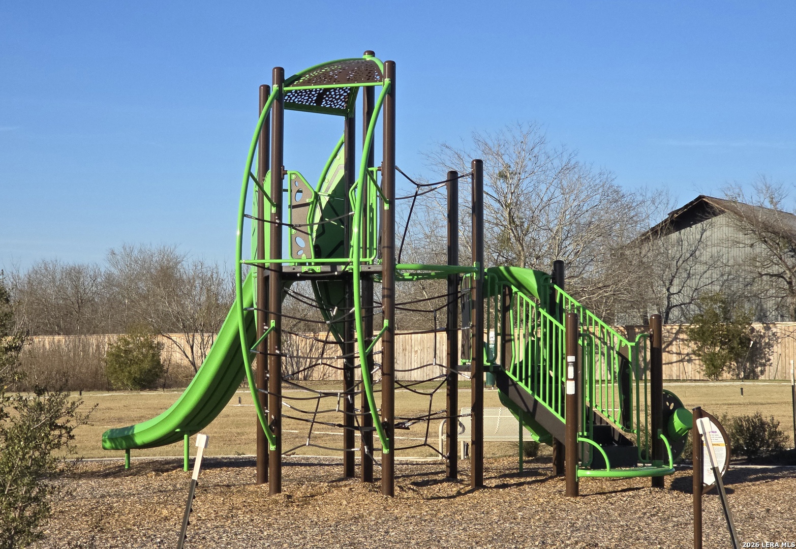 328 Celosia Loop Kyle, TX 78640 - Photo 23 of 29 a view of a chairs and table in the backyard