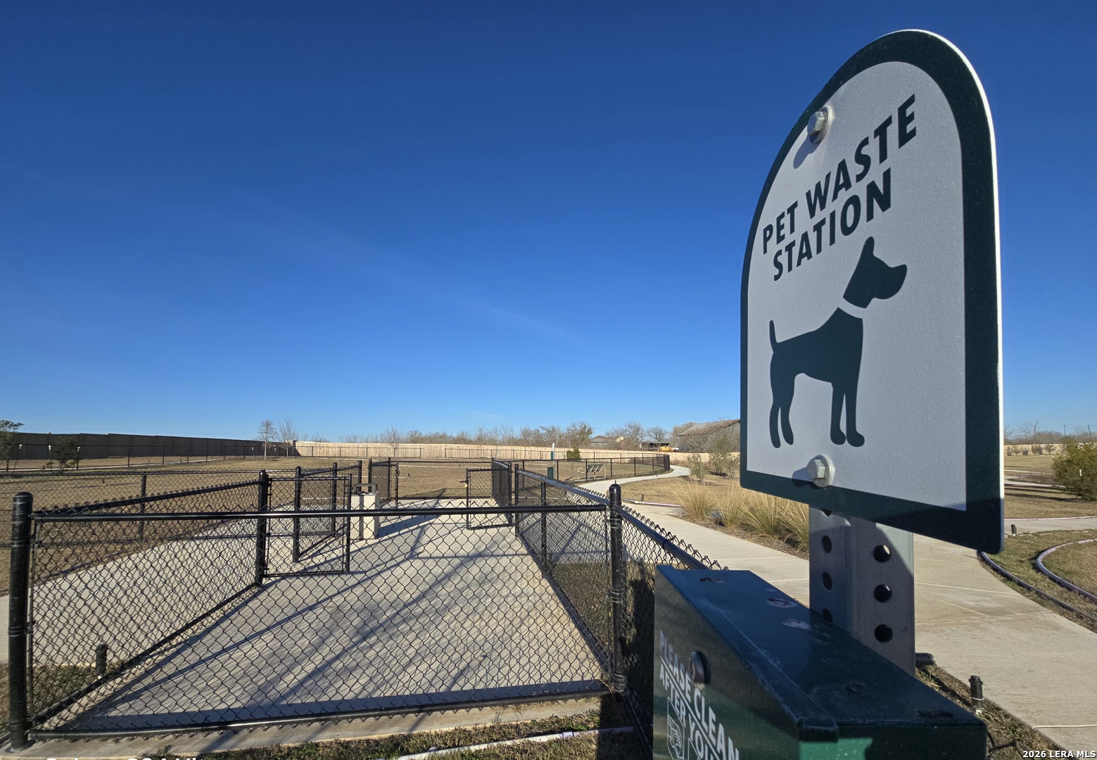 328 Celosia Loop Kyle, TX 78640 - Photo 24 of 29 a view of roof deck with wooden floor and fence