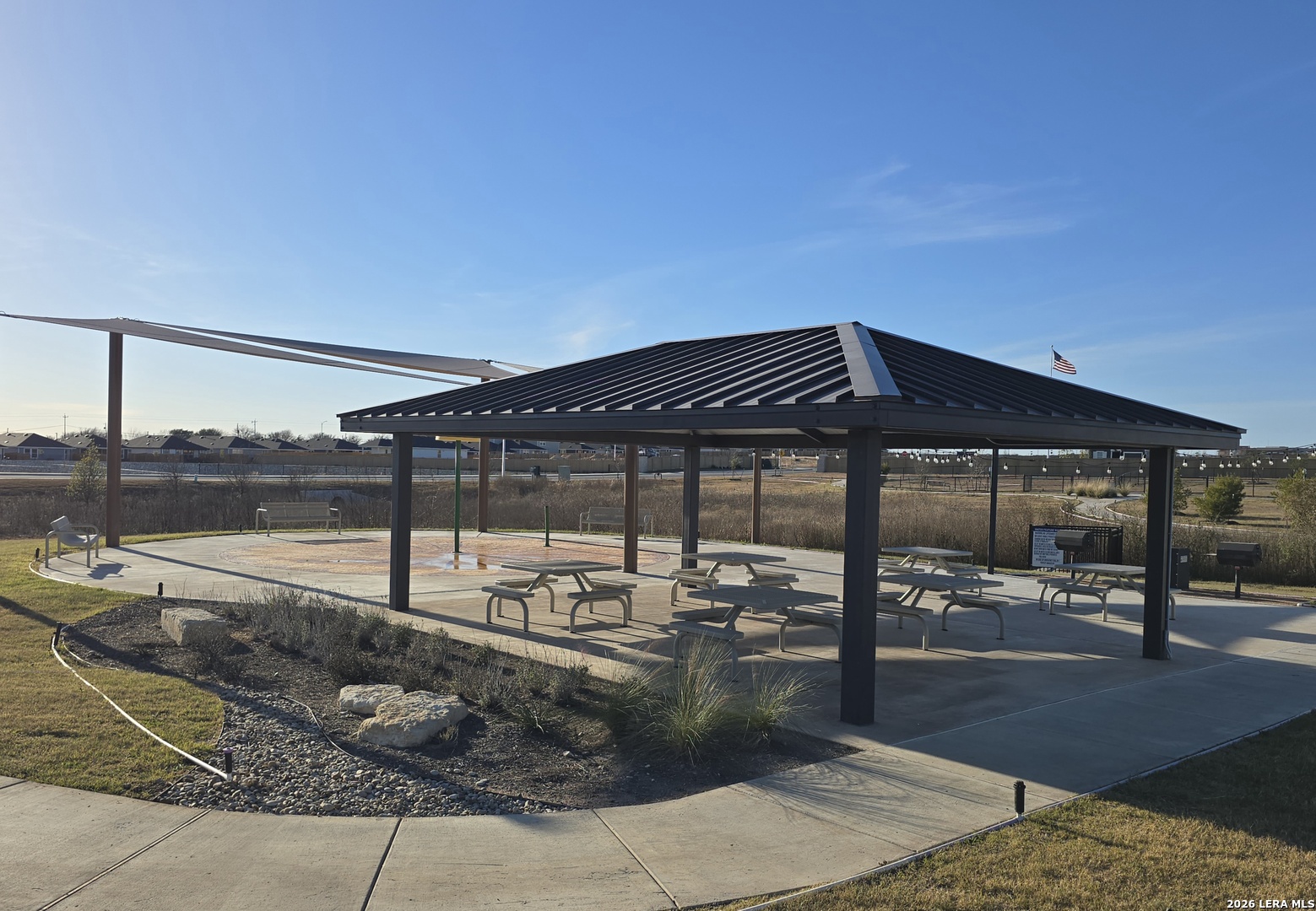328 Celosia Loop Kyle, TX 78640 - Photo 25 of 29 a patio with table and chairs