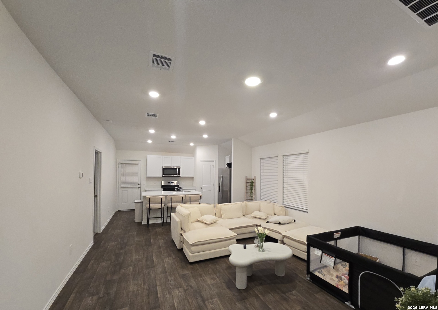 328 Celosia Loop Kyle, TX 78640 - Photo 6 of 29 a living room with furniture and a table