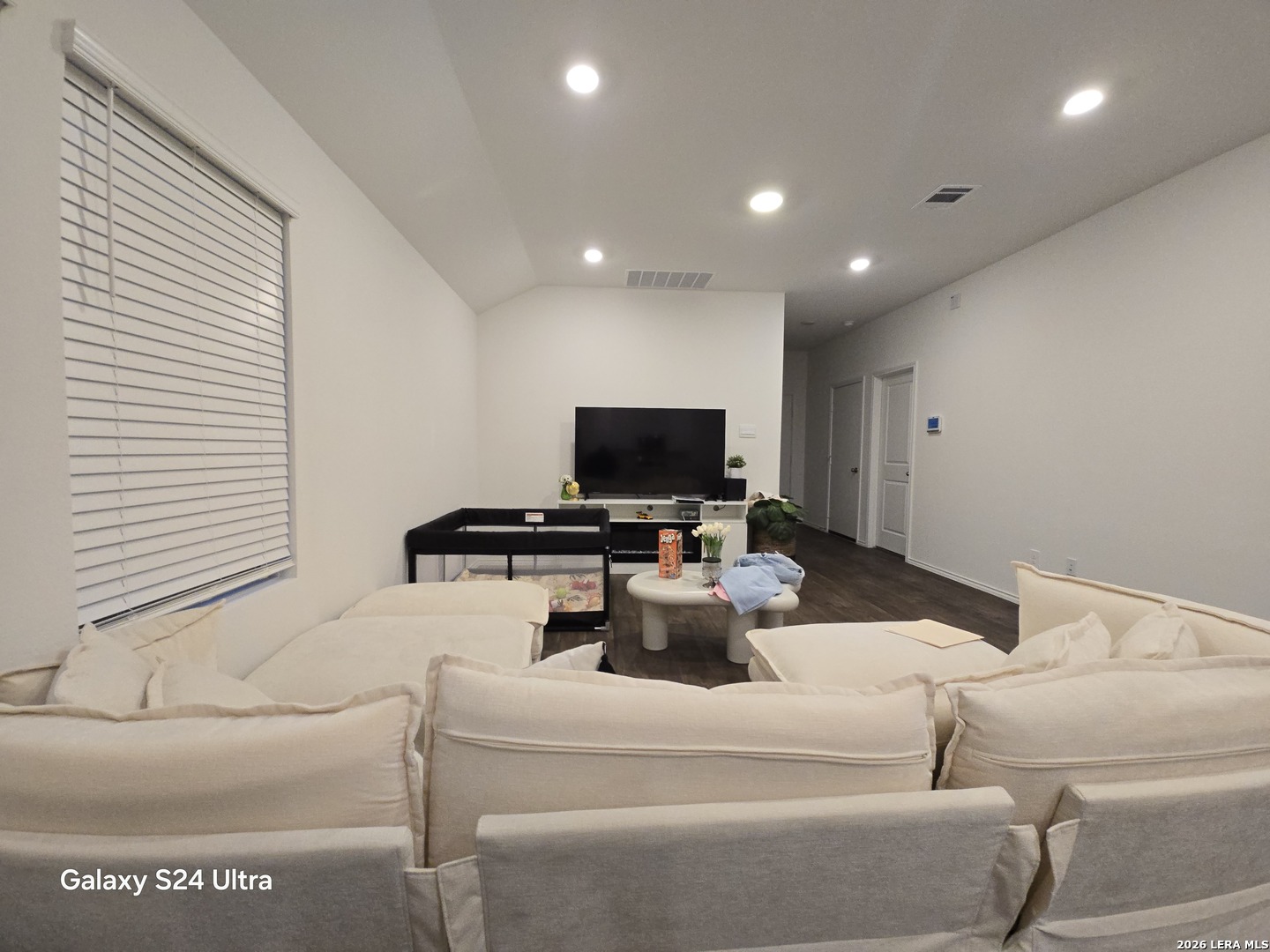 328 Celosia Loop Kyle, TX 78640 - Photo 7 of 29 a living room with furniture and a flat screen tv