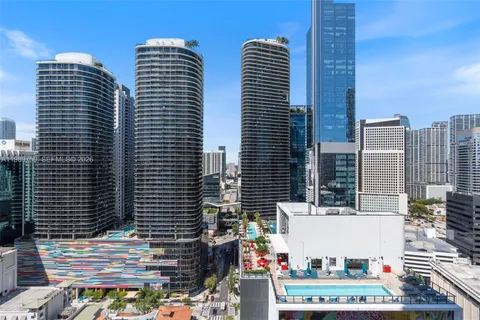 a view of a balcony with chairs