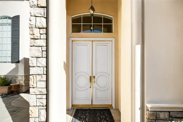 a bathroom with a window and a shower