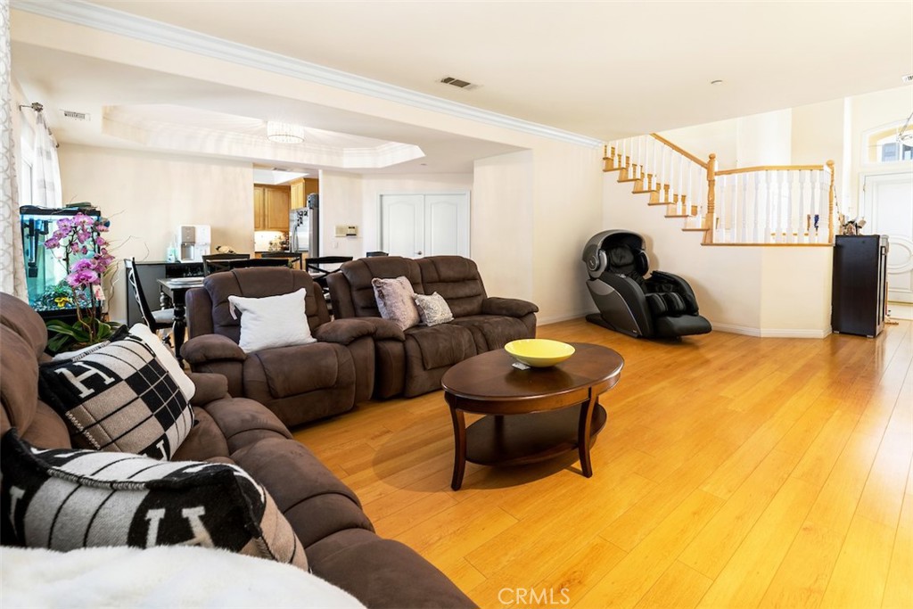 417 California Street, Unit F Arcadia, CA 91006 - Photo 4 of 21 a living room with furniture and a flat screen tv