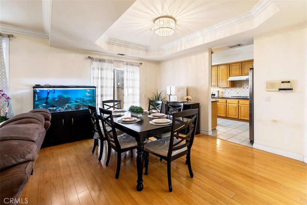 417 California Street, Unit F Arcadia, CA 91006 - Photo 7 of 21 a view of a dining room with furniture and wooden floor