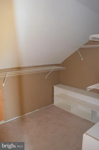 a view of a room with an empty space