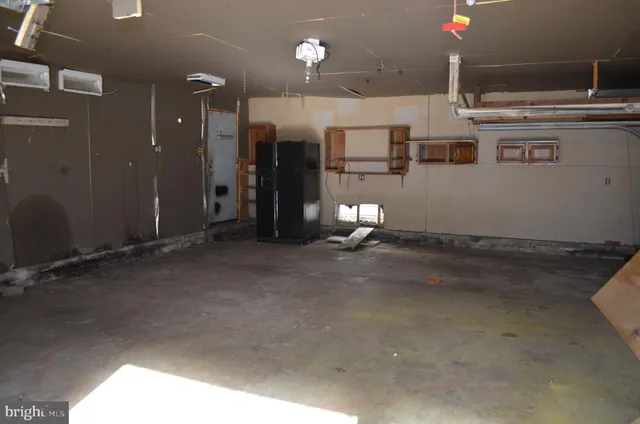 a view of wooden floor with a wooden fence