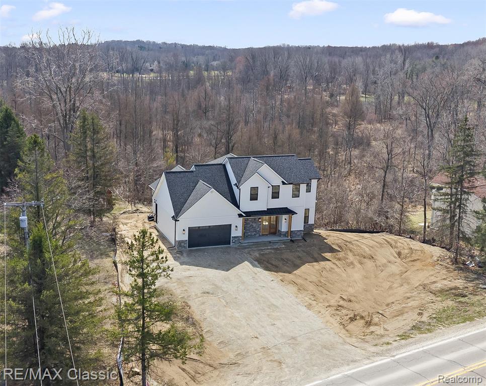 3800 East Coon Lake Road Howell, MI 48843 - Photo 1 of 46