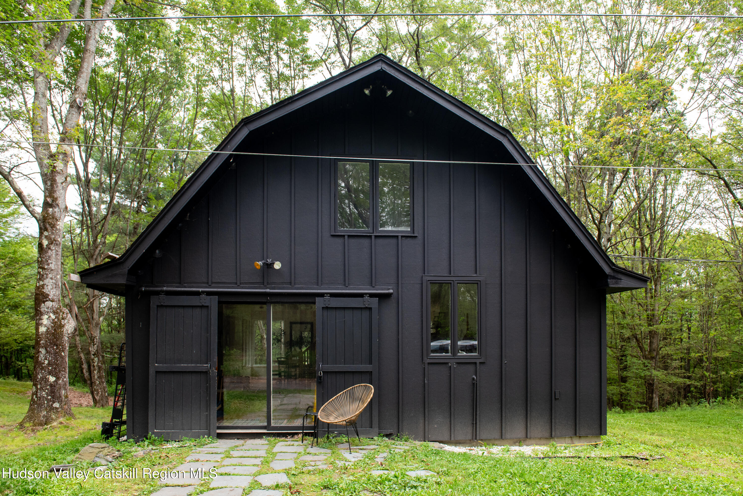 563 County Rte 34 New Lebanon, NY 12125 - Photo 2 of 22 a front view of a house with garden