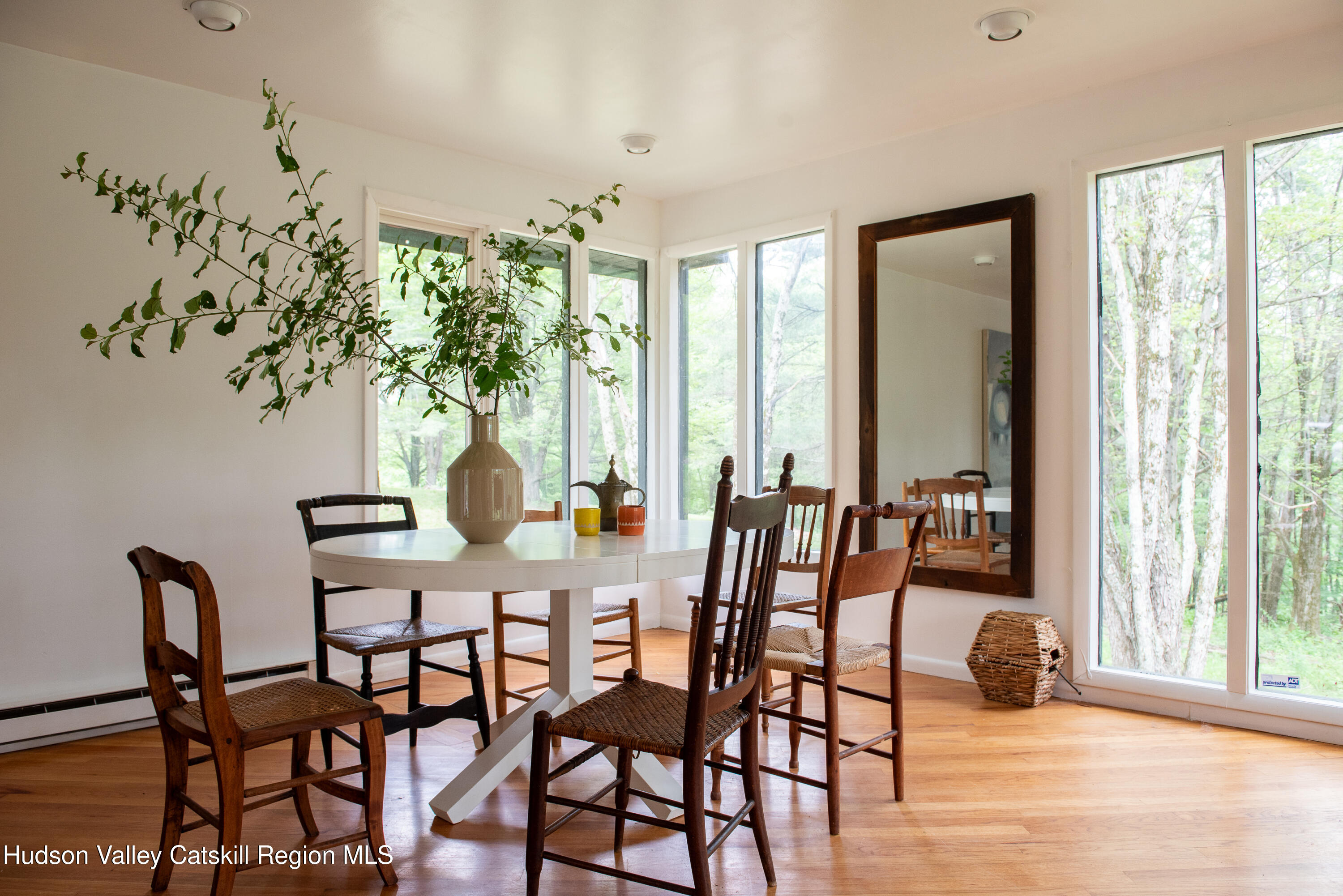 563 County Rte 34 New Lebanon, NY 12125 - Photo 3 of 22 a view of a dining room with furniture window and outside view