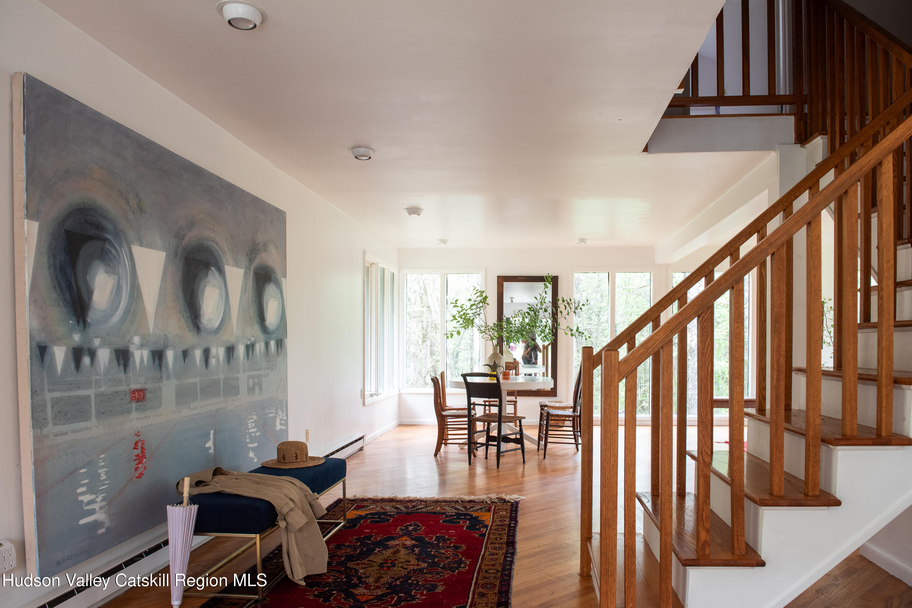 563 County Rte 34 New Lebanon, NY 12125 - Photo 6 of 22 a living room with furniture and wooden floor