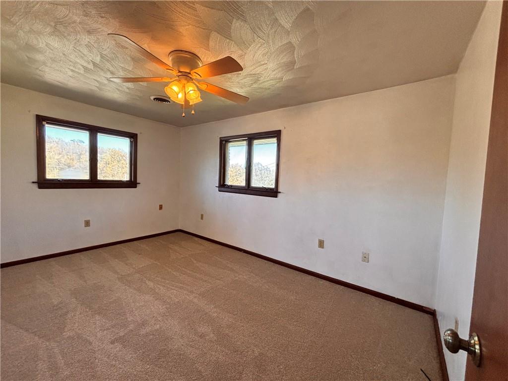 2695 West Chestnut Street, Unit 2 Washington, PA 15301 - Photo 11 of 12 an empty room with windows and fan