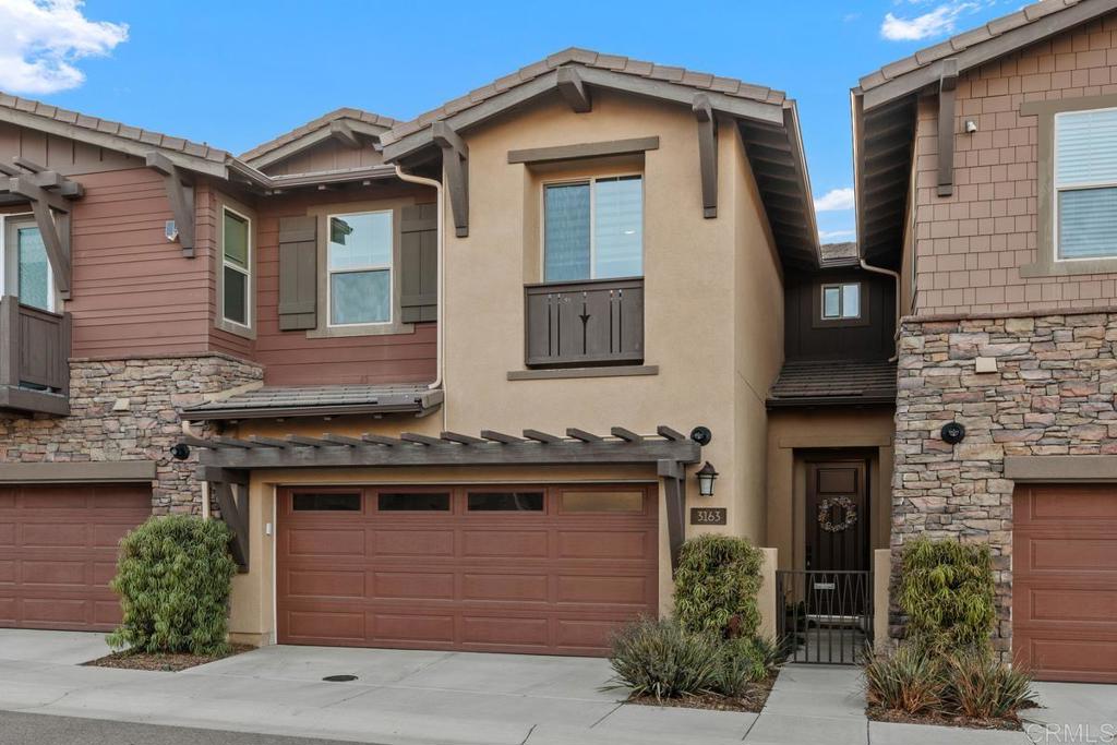 3163 Telaga Road Carlsbad, CA 92010 - Photo 1 of 1 a front view of a house with garden