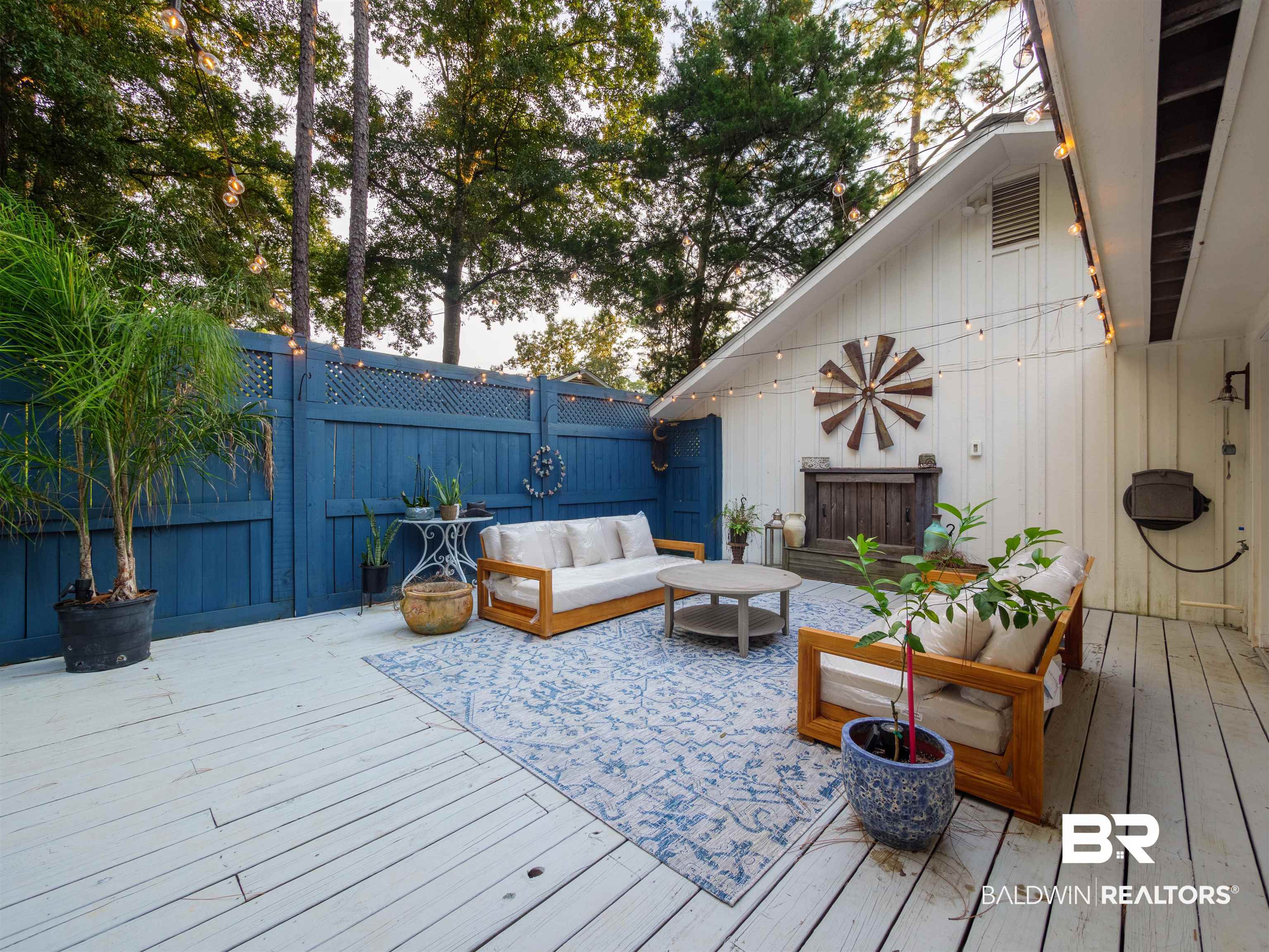 494 Ridgewood Drive Daphne, AL 36526 - Photo 35 of 40 Wooden deck with an outdoor hangout area