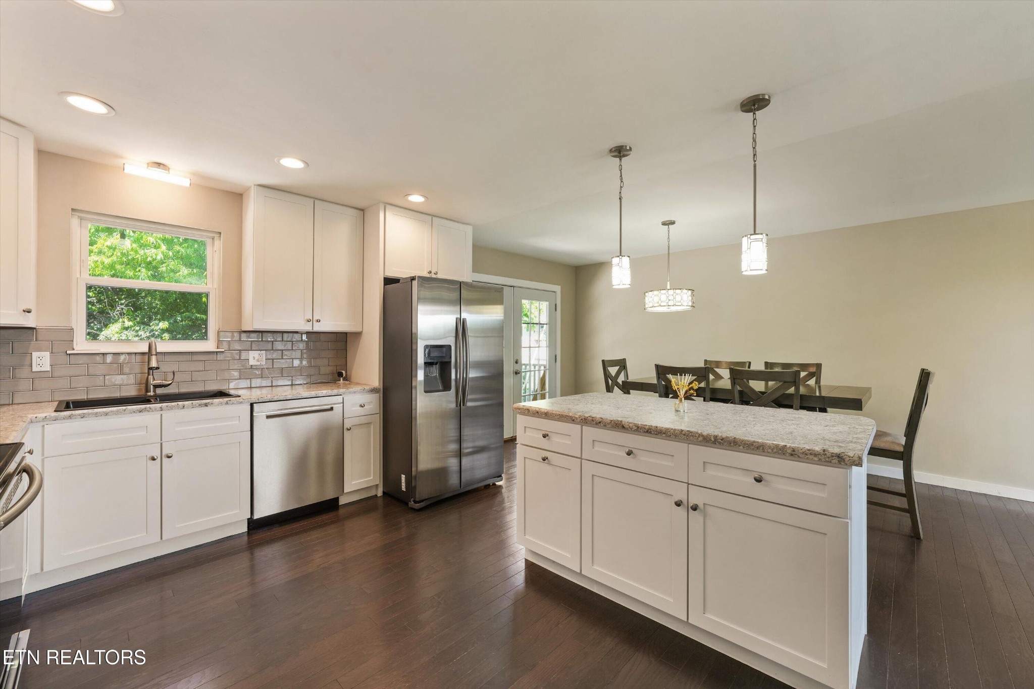 7613 Fall Wind Court Powell, TN 37849 - Photo 16 of 38 a kitchen with white cabinets and white appliances