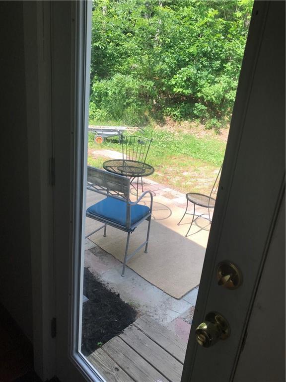 92 Webbs Mills Road Raymond, ME 04071 - Photo 25 of 30 A glimpse of the patio through the...