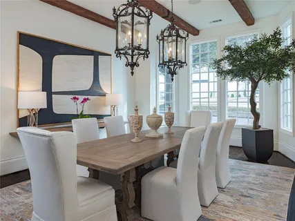a view of a dining room with furniture window and outside view