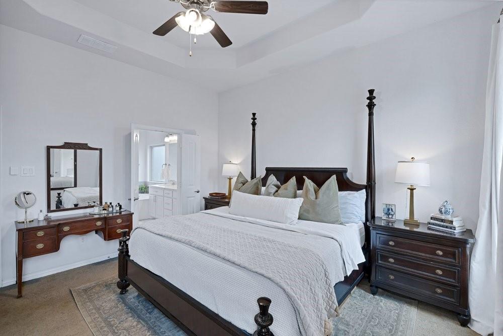 4105 Ranchman Boulevard Denton, TX 76210 - Photo 16 of 39 a bedroom with bed and window