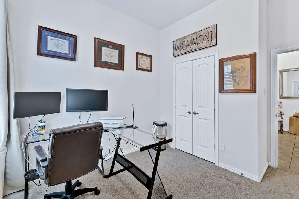 4105 Ranchman Boulevard Denton, TX 76210 - Photo 20 of 39 a view of a workspace with furniture