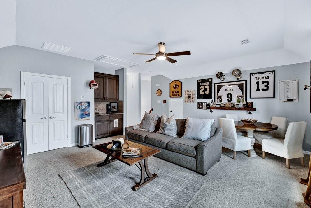 4105 Ranchman Boulevard Denton, TX 76210 - Photo 28 of 39 a living room with furniture
