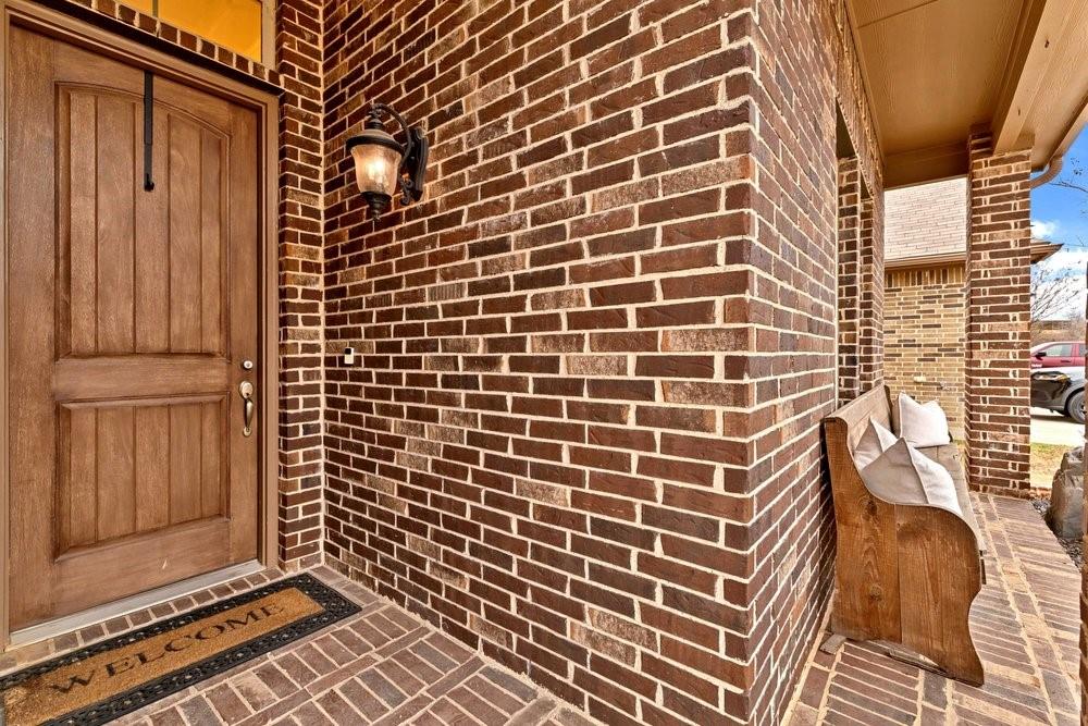 4105 Ranchman Boulevard Denton, TX 76210 - Photo 3 of 39 a view of a brick building